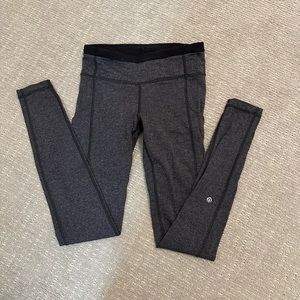 Black and charcoal grey Lululemon leggings with pockets